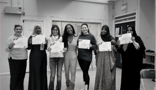 Coffee morning women getting an achievement certificate for hard work